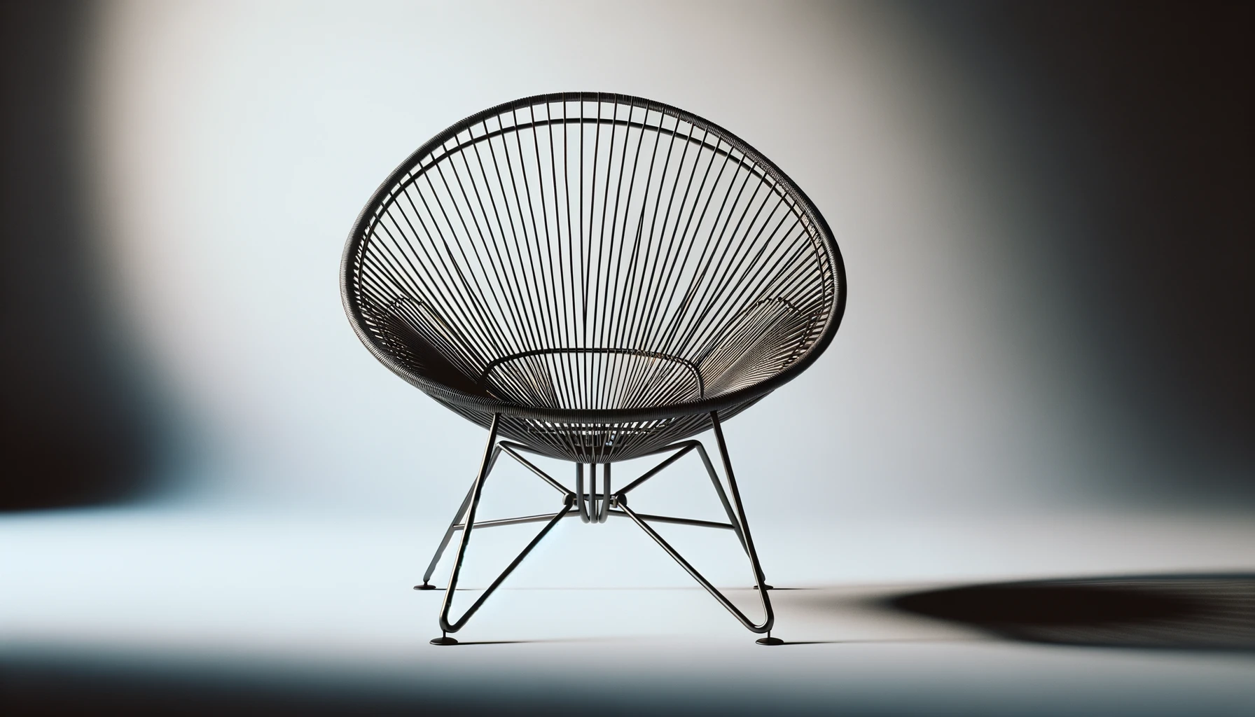 dall%c2%b7e-2024-02-09-20-53-50-a-modern-acapulco-chair-with-a-black-steel-wire-frame-designed-in-a-distinctive-web-like-pattern-forming-a-rounded-bowl-like-seat-the-chairs-design-9343238