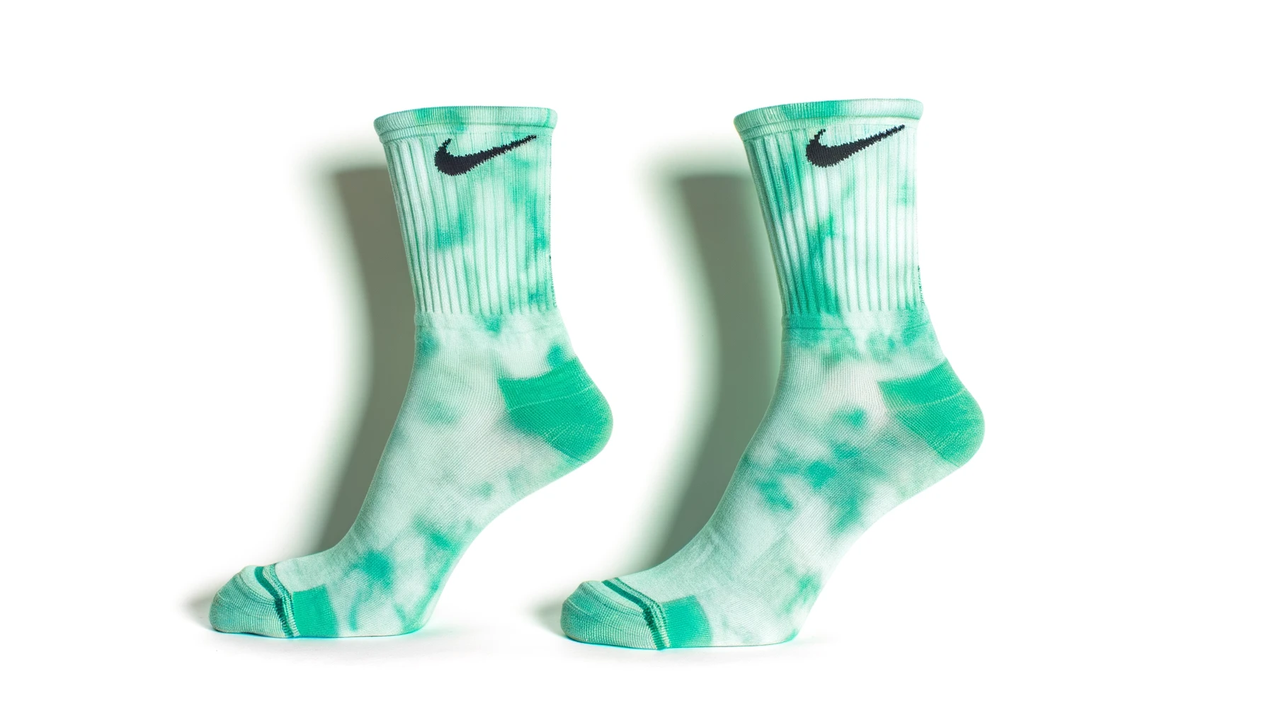 DALL·E-2024-02-19-16.45.26-A-pair-of-mint-green-crew-socks-with-a-subtle-tie-dye-pattern-and-black-swoosh-logos-near-the-top-cuff-positioned-standing-up-as-if-filled-out-by-fee-9137957 dall%c2%b7e-2024-02-19-16-45-26-a-pair-of-mint-green-crew-socks-with-a-subtle-tie-dye-pattern-and-black-swoosh-logos-near-the-top-cuff-positioned-standing-up-as-if-filled-out-by-fee-9137957