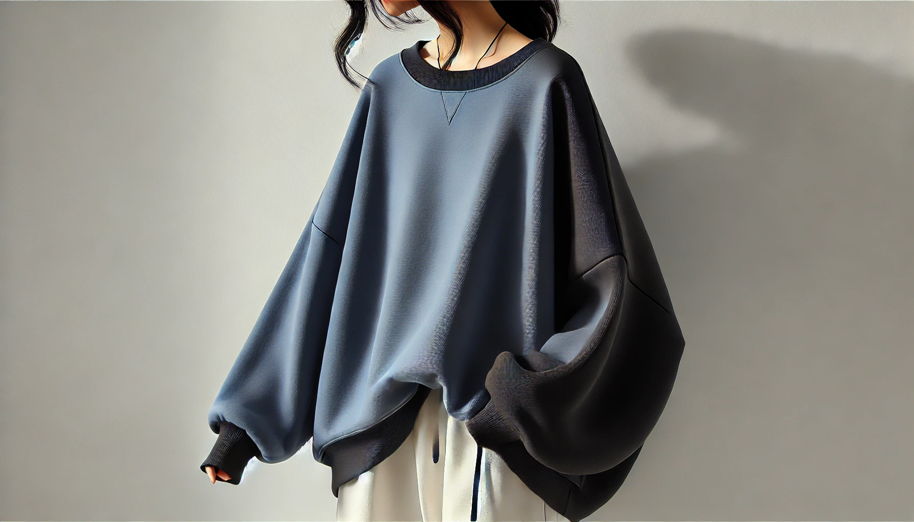 DALL·E 2025-02-13 12.37.49 - A stylish oversized women's sweatshirt in a casual and trendy design. The sweatshirt features a loose fit for a comfortable and modern look, with side